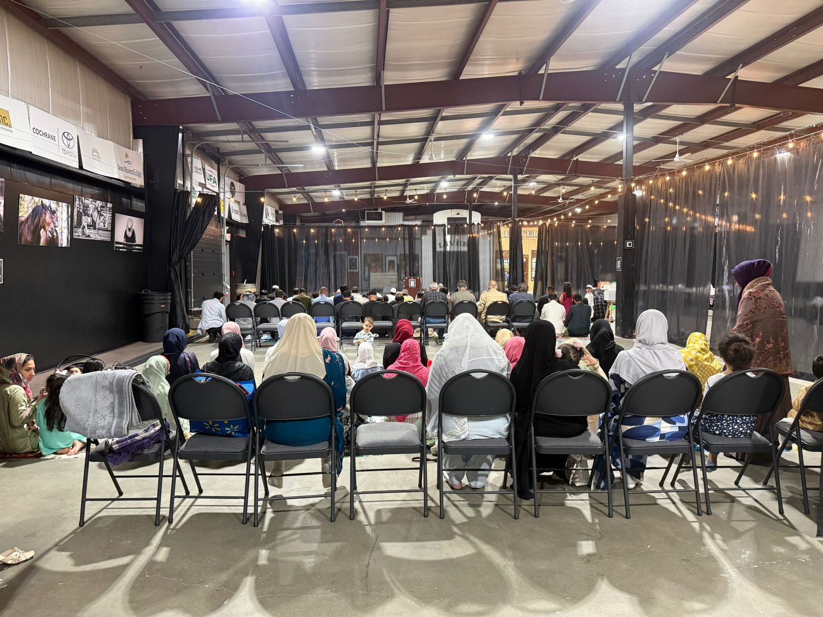 Muslims of Cochrane community members attending an indoor gathering